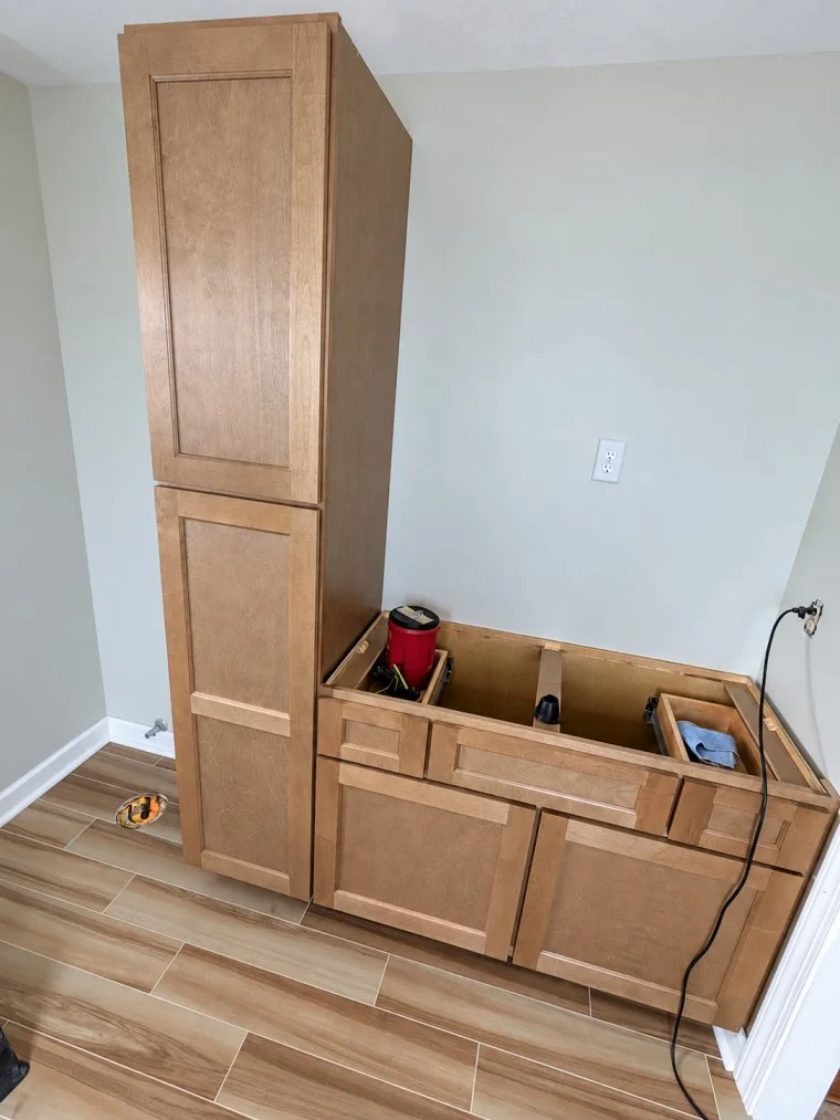 Oak bathroom cabinet installation